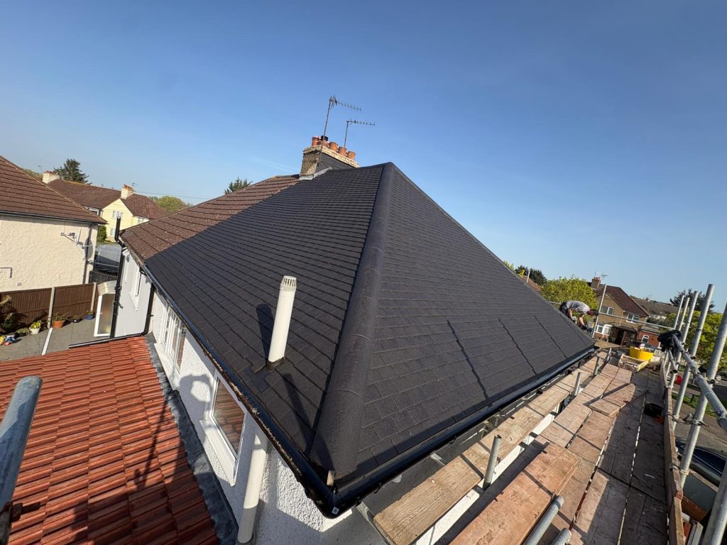 Completed black roof coating project by roof cleaning specialists in North London