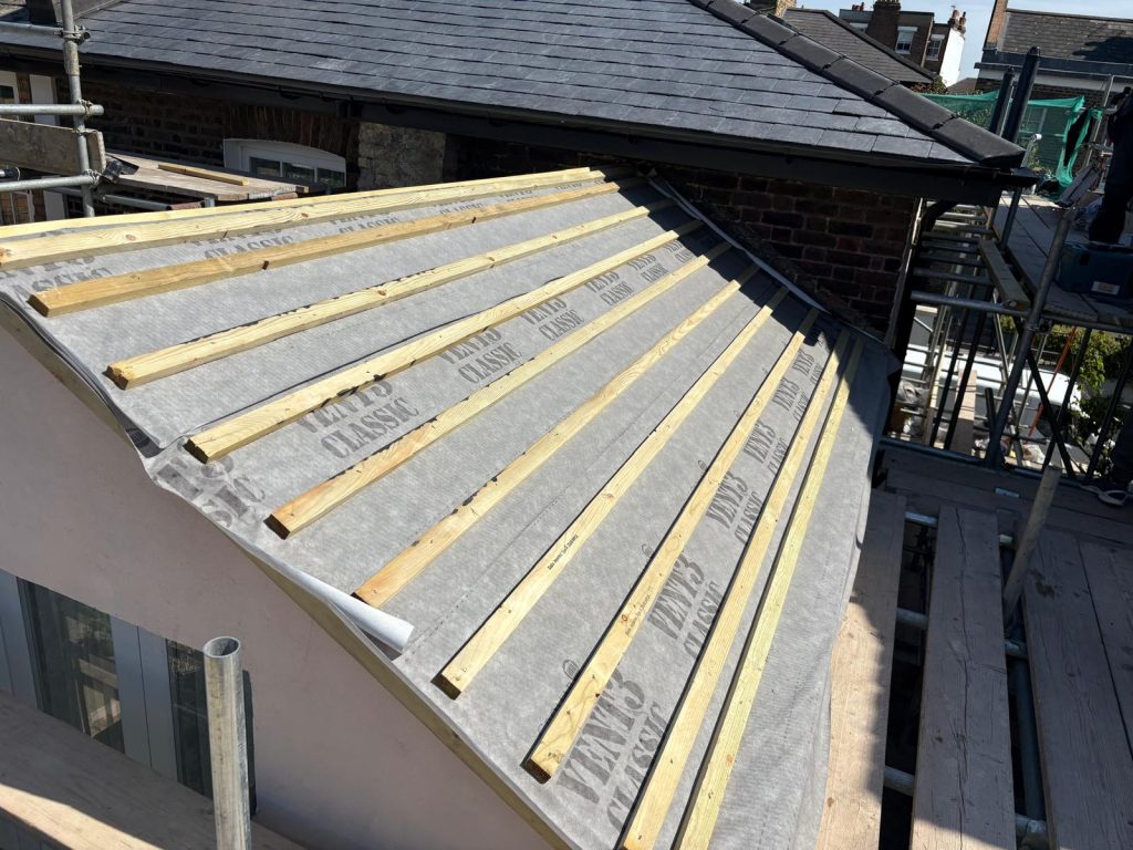 Breathable membrane and roof battens installation by roofers in North London